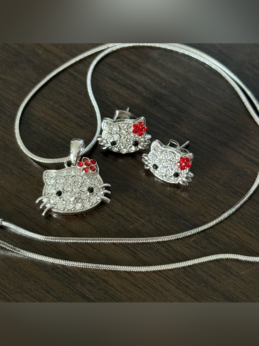 Hello kitty necklace and earrings